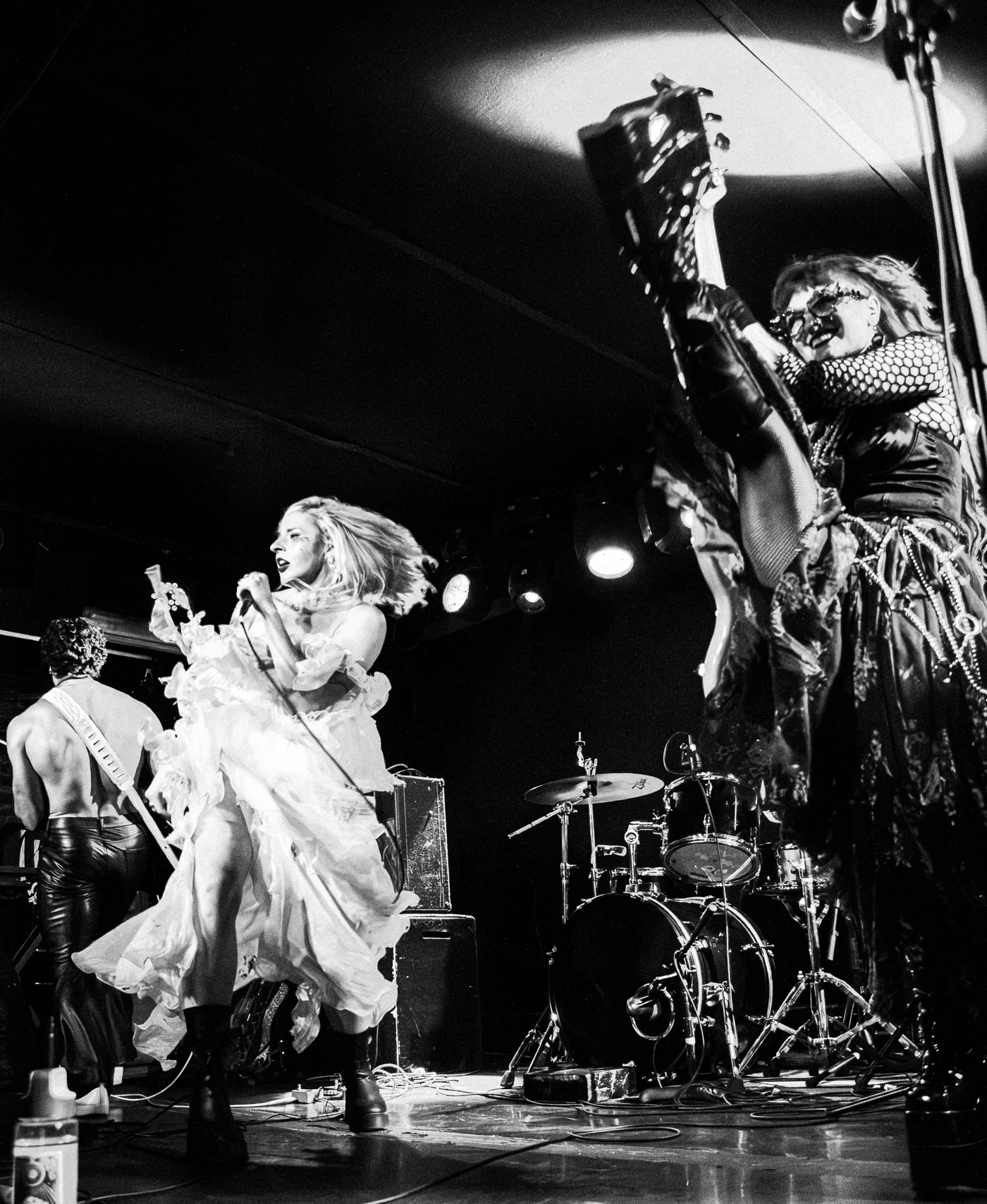 Sunday and her band in a black and white live photograph